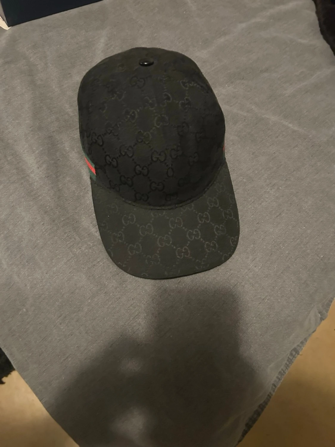 Svart keps från Gucci med monogram