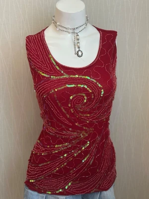  paljettprydd ärmlös topp - M/L