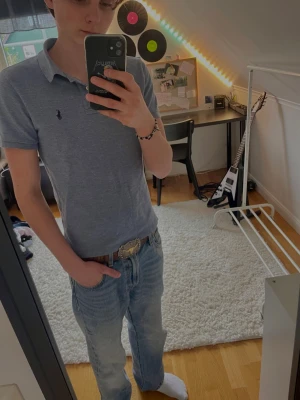 Blå pikétröja från Polo Ralph Lauren - Snygg pikétröja från polo Ralph lauren! Storleken är L i barnstorlek men XS i herr storlek. Hör av dig om du har frågor
