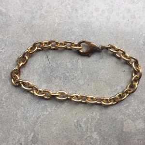 Guldfärgad armkedja - +11 för frakt