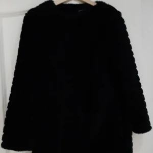 Black fur coat - Nice and elegant black fur coat