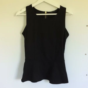  - Peplum topp! Använd men i bra skick