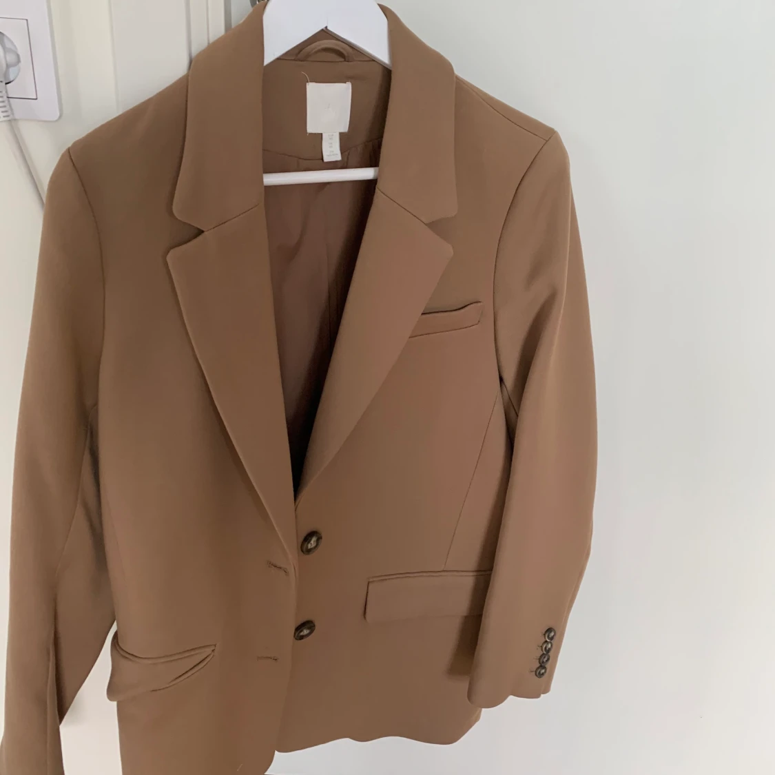 Beige kappa från hm - 90