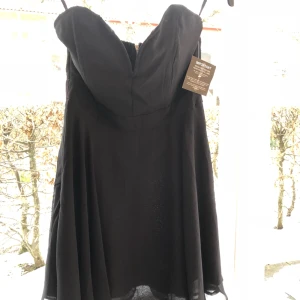  - Klänning från Nelly helt oanvänd med lappar kvar. 