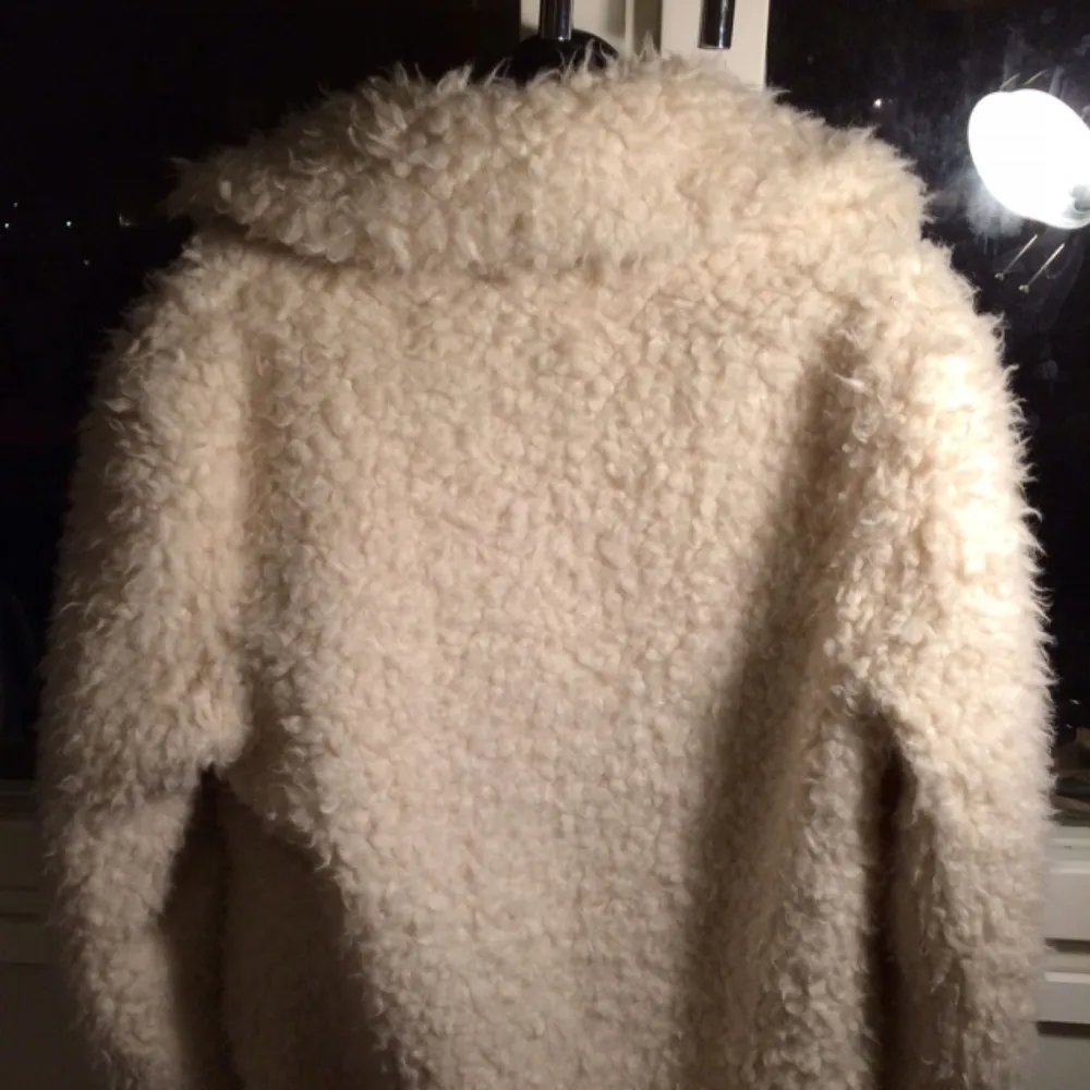 White cozy and warm coat.  Used only a few times.  . Jackor.