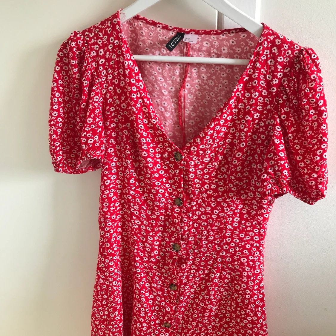 Blommig klänning storlek 34 - 91