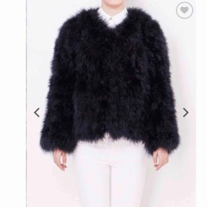  - Jätte fin fjäderjacka i mycket bra skick!