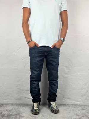 Nudie jeans  - Ett par riktigt snygga jeans från Nudie i storlek W28 L34 i modellen Tube Kelly 