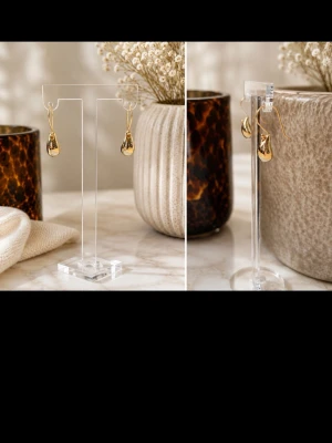 Guldiga droppformade örhängen i stål - Säljer ett par stilrena örhängen i droppformad design med blank guldfinish. Örhängena har en enkel krok och en modern, minimalistisk look som passar till många stilar. Perfekta för dig som gillar trendiga accessoarer med en elegant touch. Stainless steel 