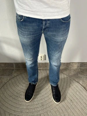Dondup Mius Jeans - CONDITION — 9/10 Excellent condition.  Light signs of wear.     SIZE — 34 Model is 185 cm, 80kg  MEASUREMENTS (CM) (Please refer to the last photo for measurement guide)  A — 43 cm  B — 95 cm  C — 17 cm