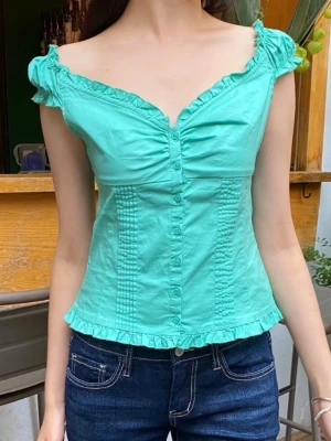Turkos Brandy Melville elena top - Köpt på japanska Brandy Melville. Lite högt pris då den inte går att hitta i Europa 🩵🩵One-size 
