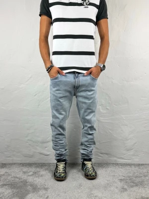 Nudie jeans  - Ett par riktigt snygga jeans från Nudie i storlek W33 L34 i modellen Skinny Lin 