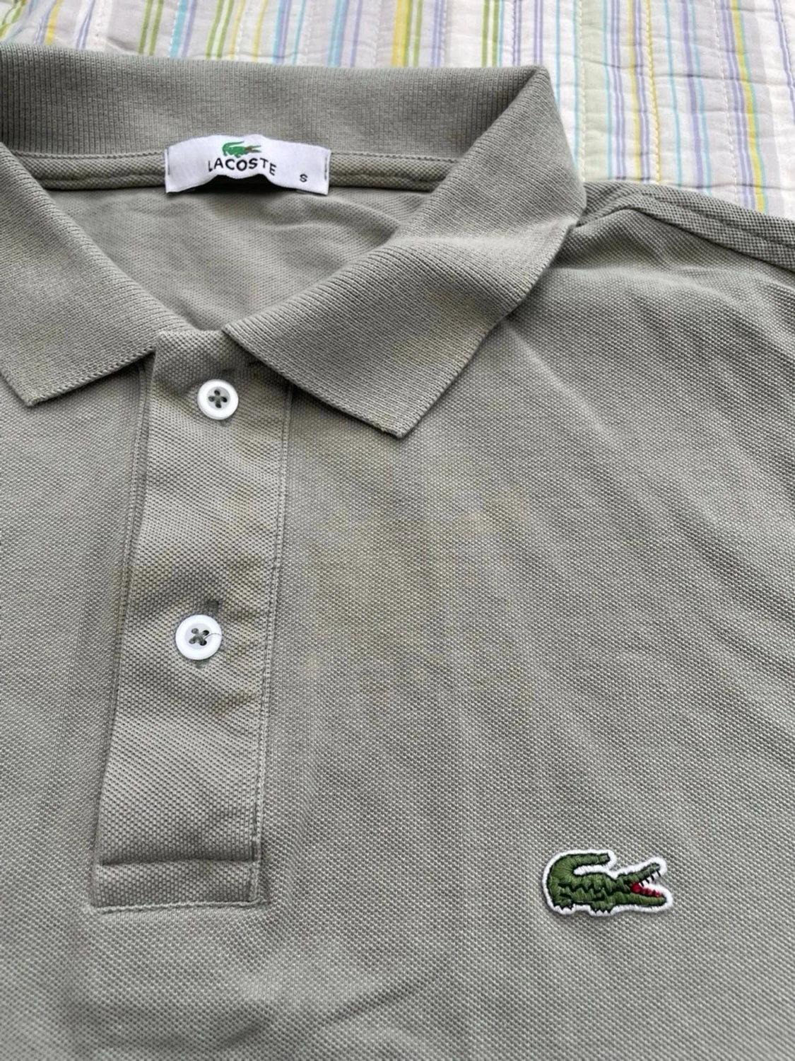 Grå pikétröja från Lacoste - 1
