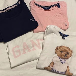 Gant och ralph lauren Tshirts - Super mjuka och sköna t-shirts, dom är lite använda men ser helt nya ut. Skulle säga att dom passar xxs-s beroende på hur man vill att dom ska sitta. Alla för 200kr inkl frakt, kan diskuteras vid snabb och smidig affär!  Blå Gant tshirt - strl 170/15år fint skick Rosa Gant tshirt - strl 170/15år fint skick Vit Gant tshirt - strl 158-164/13-14år fint skick Vit polo tishirt - strl XL/16 år fint skick