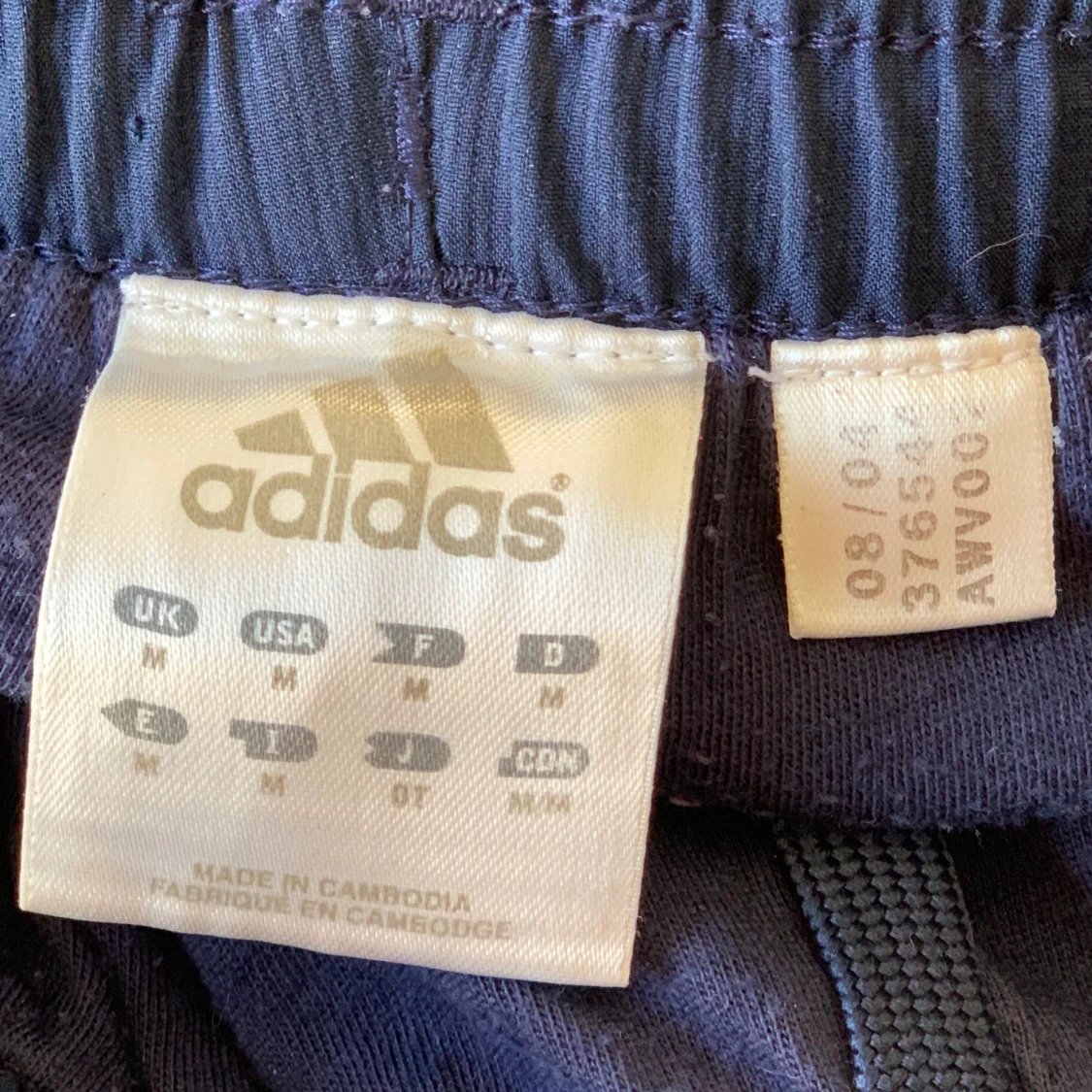 Blåa adidas byxor  - 91