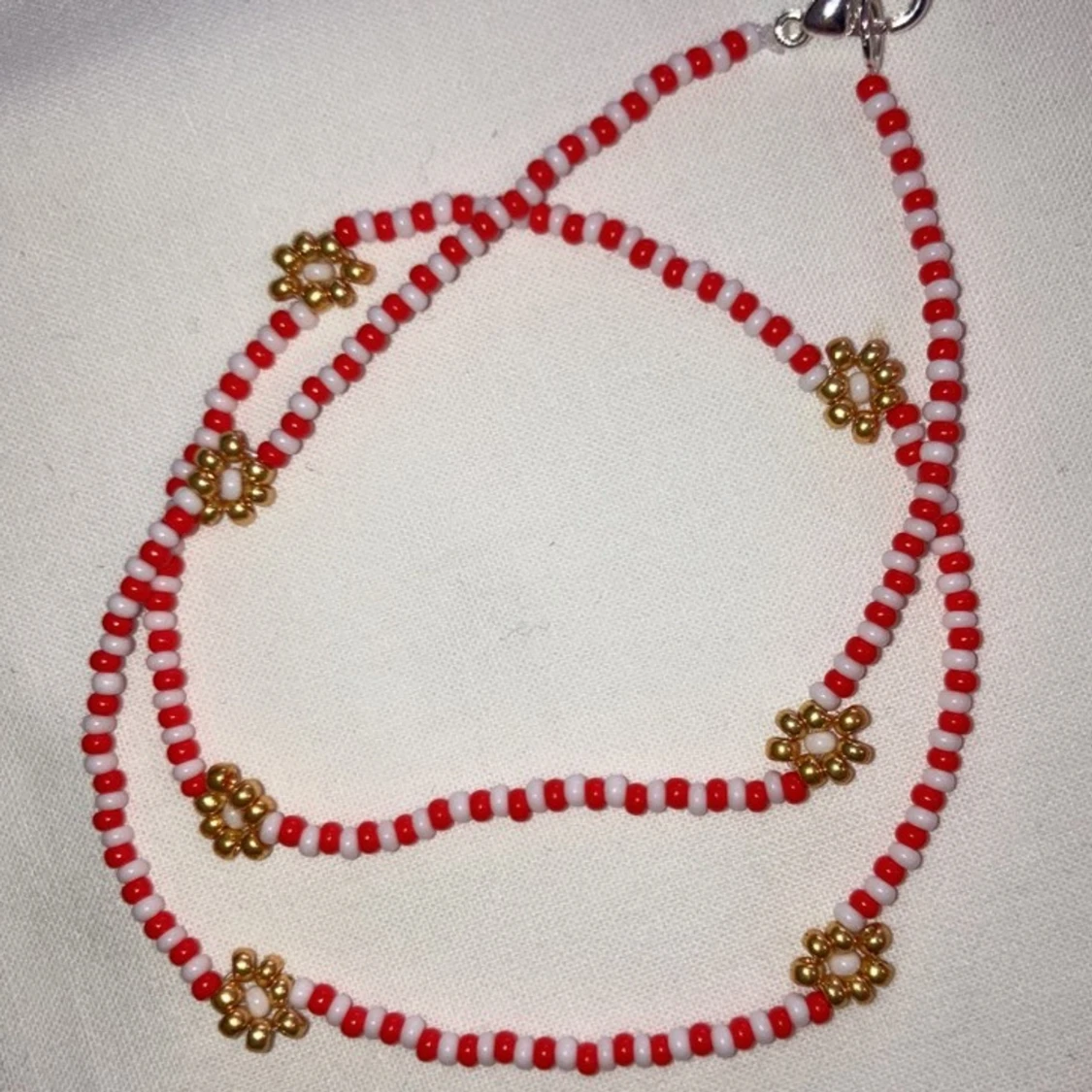 Halsband blommor - 91