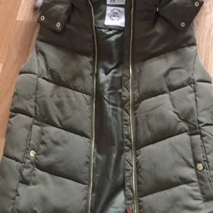 Väst  - Fin väst i grön färg 