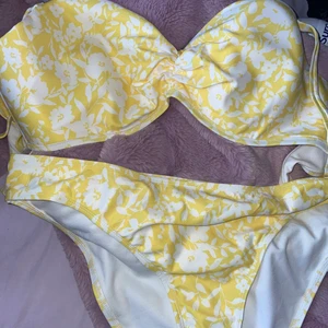 bikini - never been worn , bottoms are a size 16 but are really tight so can fit a 14 , top is a size 38D/DD , will accept reasonable offers