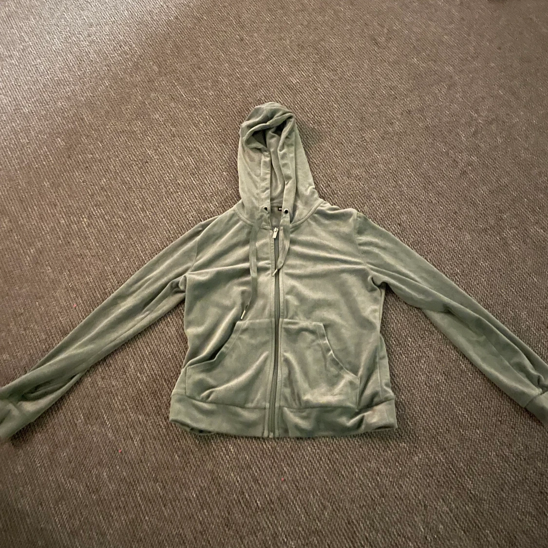 Grön hoodie