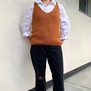 Vest - Like new. Only tag is not attached. 