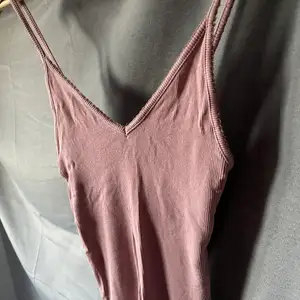 Dusty pink top in size XS, in good condition. 