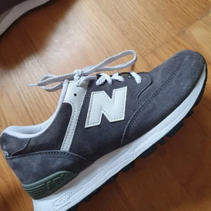 New Balance 576 sneakers, strl 36 1/2 - Ett par grå New Balance 576 sneakers i storlek 36 1/2 (UK 4). Använda en gång och säljs pga för små, mycket fint skick. Ordinarie pris 899 kr.