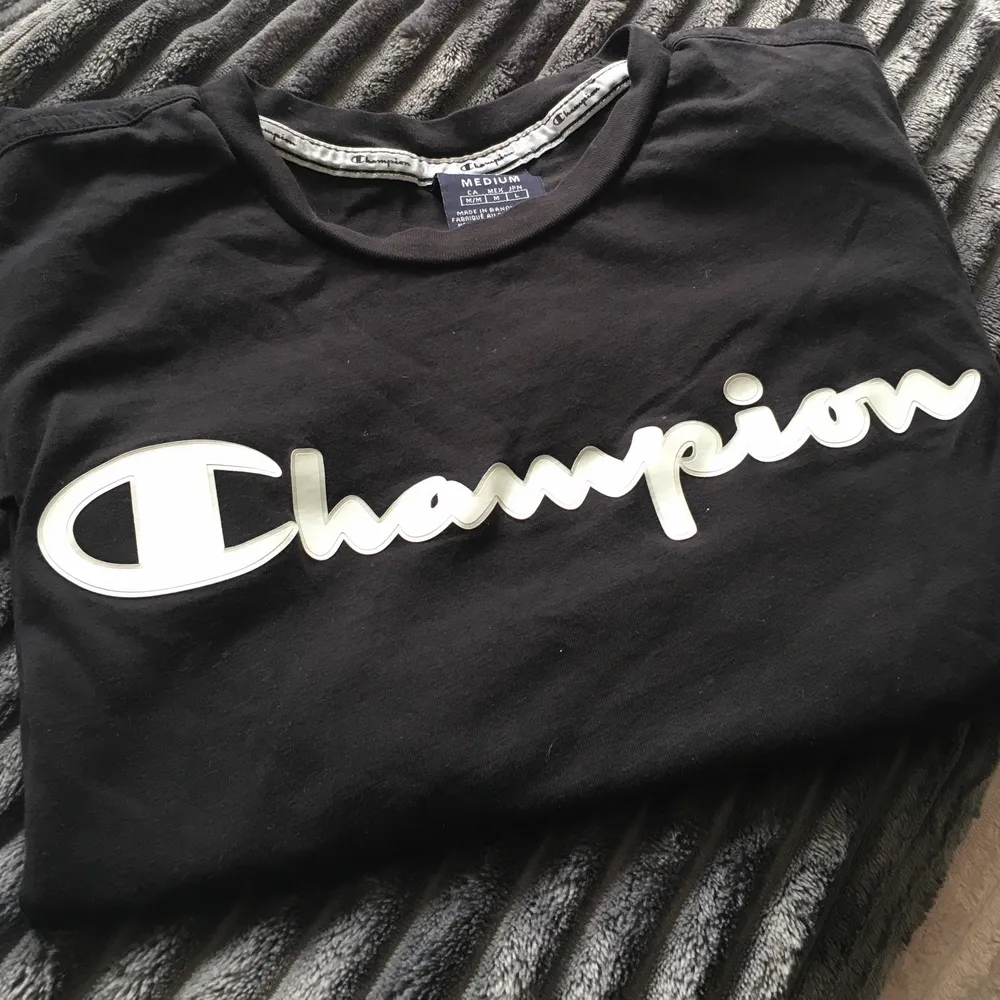 Champion tshirt. T-shirts.