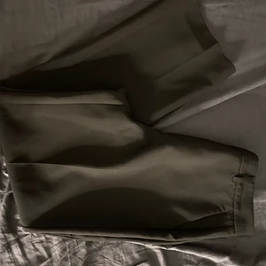 Fina kostymbyxor  - Svarta oanvända kostymbyxor 