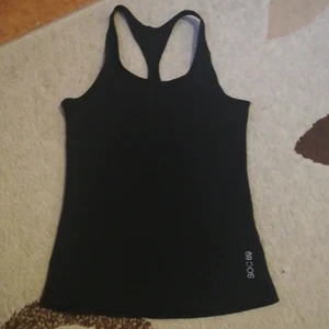 Svart träningslinne - Midja 60 cm, längd framifrån 52 cm går att använda som ett vanligt linne. Köparen betalar 50 kr för frakt