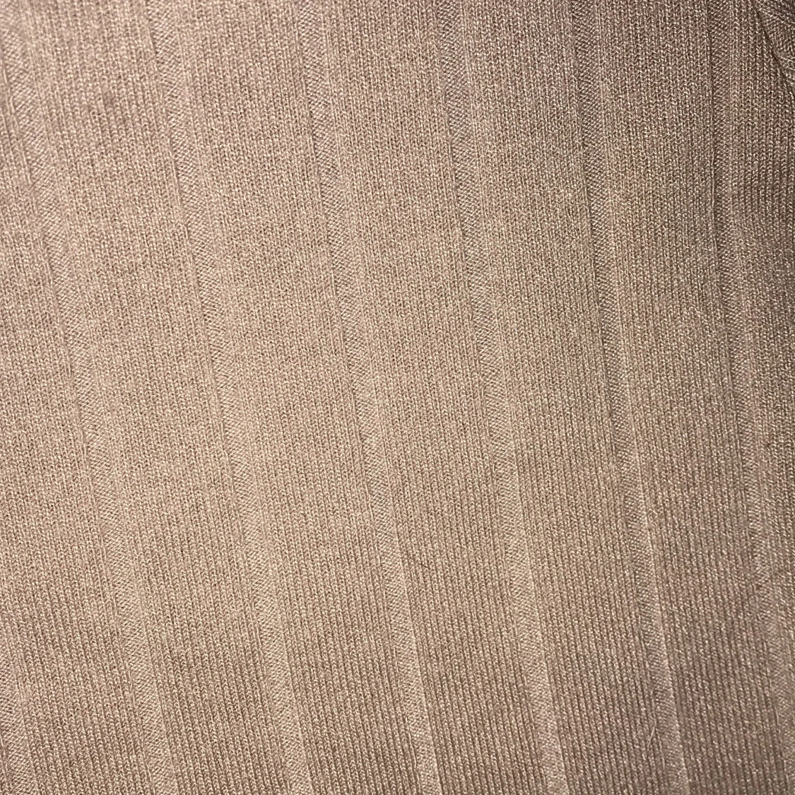 En beige tröja - 91