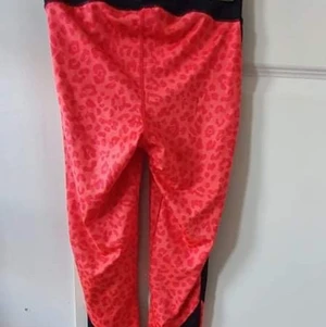 Rosa leopard träningstigths  - Rosa leopard träningstigths storlek XS