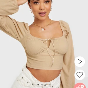 Beige långärmad topp - Snygg beige tröja från Nelly! Endast provad så i nyskick! Helt slutsåld 