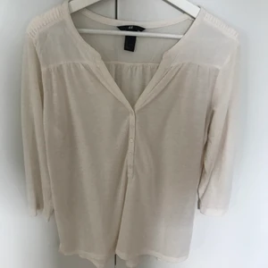 Tröja med trekvartsärm - Vit tröja med trekvartsärm