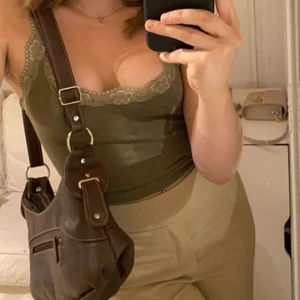 Linne - Grönt linne i storlek xs. Den passar S också! Jätte fin!