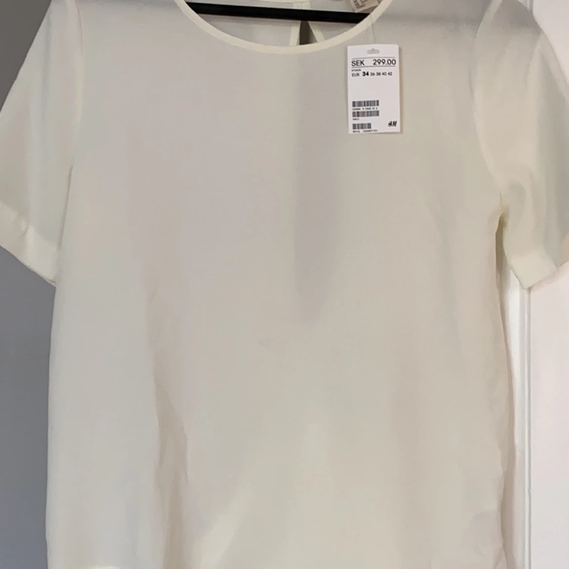 Ny topp med detaljer i ryggen