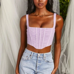 Mesh Corset Crop Top, strl 36 - Superfin mesh korsett top i lilac med dragkedja i bak, 130kr + frakt. Endast testad och storleken passade inte mig (uk 8)! Originalpris: £35