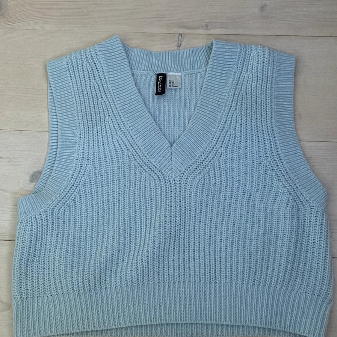 Blå stickad väst