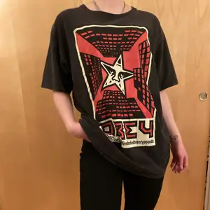A skater T-shirt from Obey, love this shirt and sad to have to put it on sale. Super comfortable. Over size look on a girl, bought on males section. 100% cotton. 