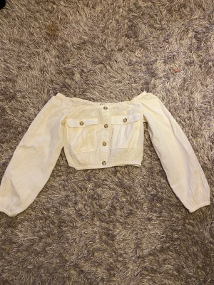 Off shoulder topp - Off shoulder topp i storlek 34 Använd någon gång 