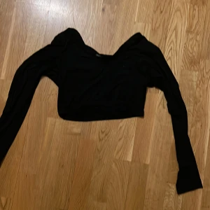 Topp  - Kort topp i storlek xs 