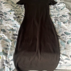 Klänning - En klänning från H&M i storlek XS