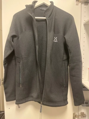 Haglöfs - Oanvänd Haglöfs fleece tröja med dragkedja