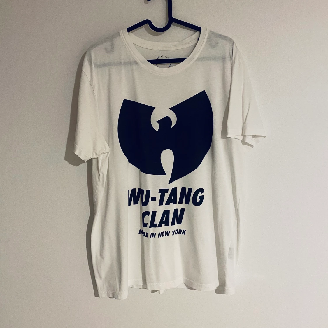 T-shirt med Wu-tang clan tryck. 