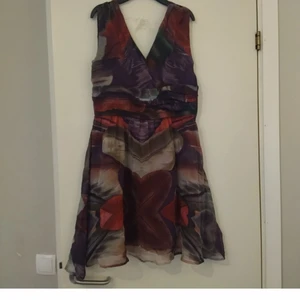 Stockh LM klänning stl 40 av siden  - 100% siden 