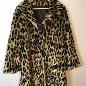 Fur coat - Brand new beautiful fur coat. 