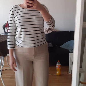 Striped shirt with satin-bow in the back - S - ONLY - Black and white striped light sweater with a satin bow detail in the back - 55% cotton, 40% polyester, 5% elasthane