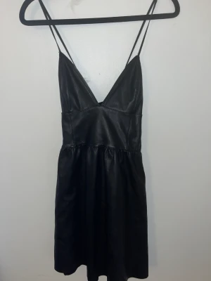 Klänning  - Skinnklänning 