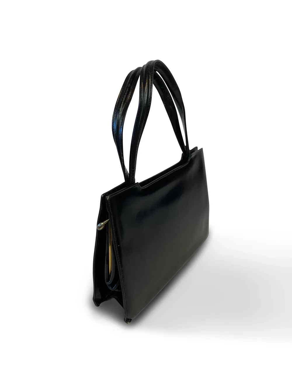 50's Leather Handbag  -Black Leather -Excellent Condition -One Size  Measurements -Width: 27cm -Depth: 7cm -Height: 18cm. Väskor.