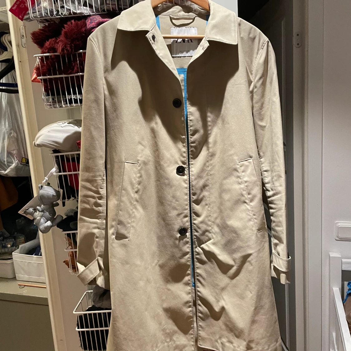 Beige rängntät kappa