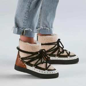 Inuikii skor - Köpta förra vintern, endast använda fåtal gånger så väldigt bra skick! Superfina!